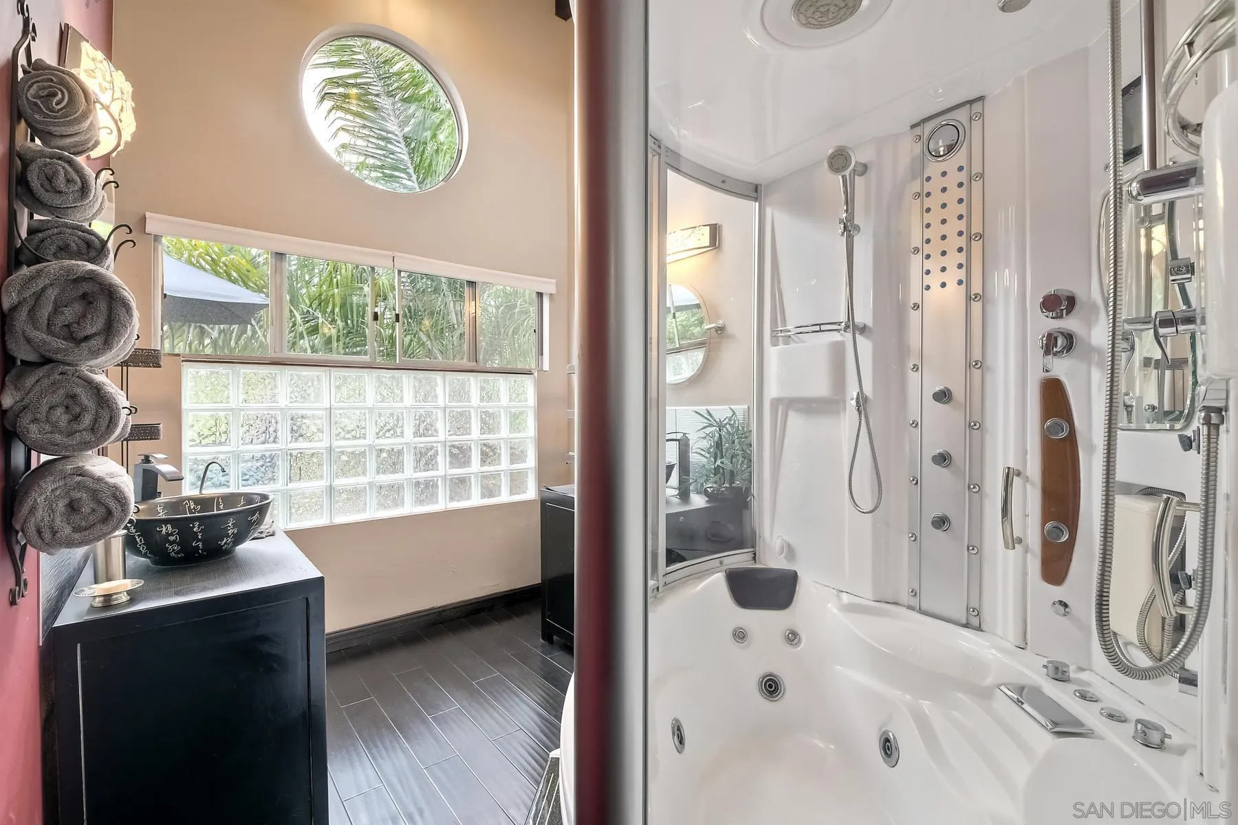 536 Saxony Road Encinitas, CA 92024 - Photo 30 of 57 a bathroom with a bathtub and a shower