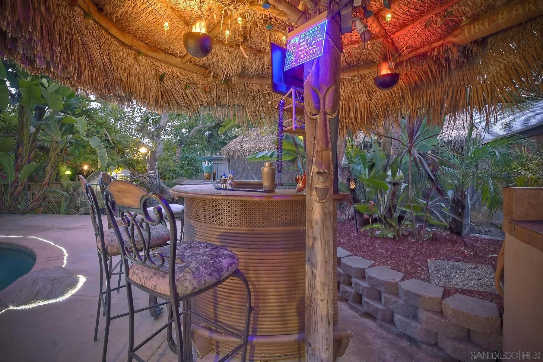 536 Saxony Road Encinitas, CA 92024 - Photo 37 of 57 a view of a chairs and tables in the patio
