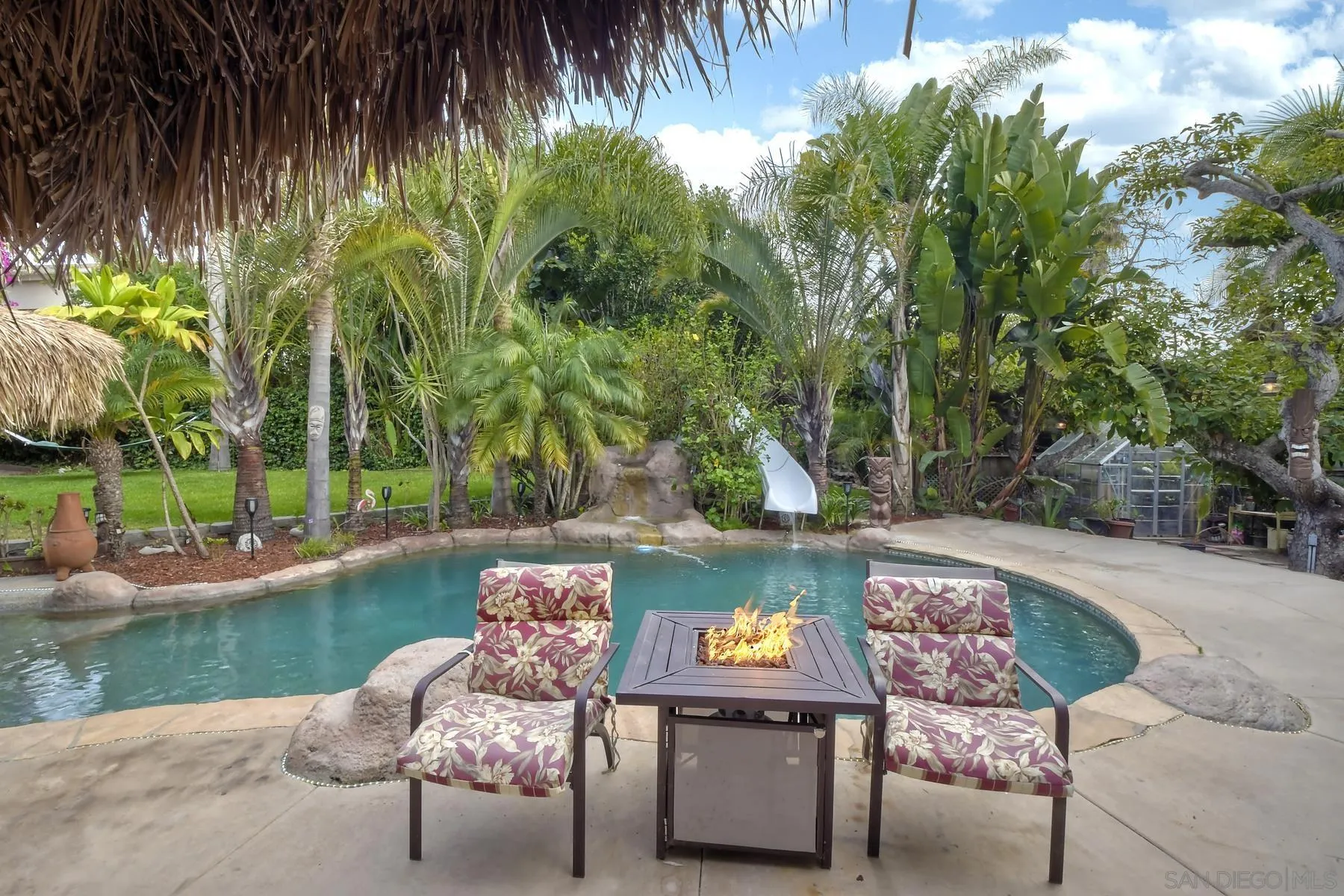 536 Saxony Road Encinitas, CA 92024 - Photo 45 of 57 a view of a backyard with sitting area and garden