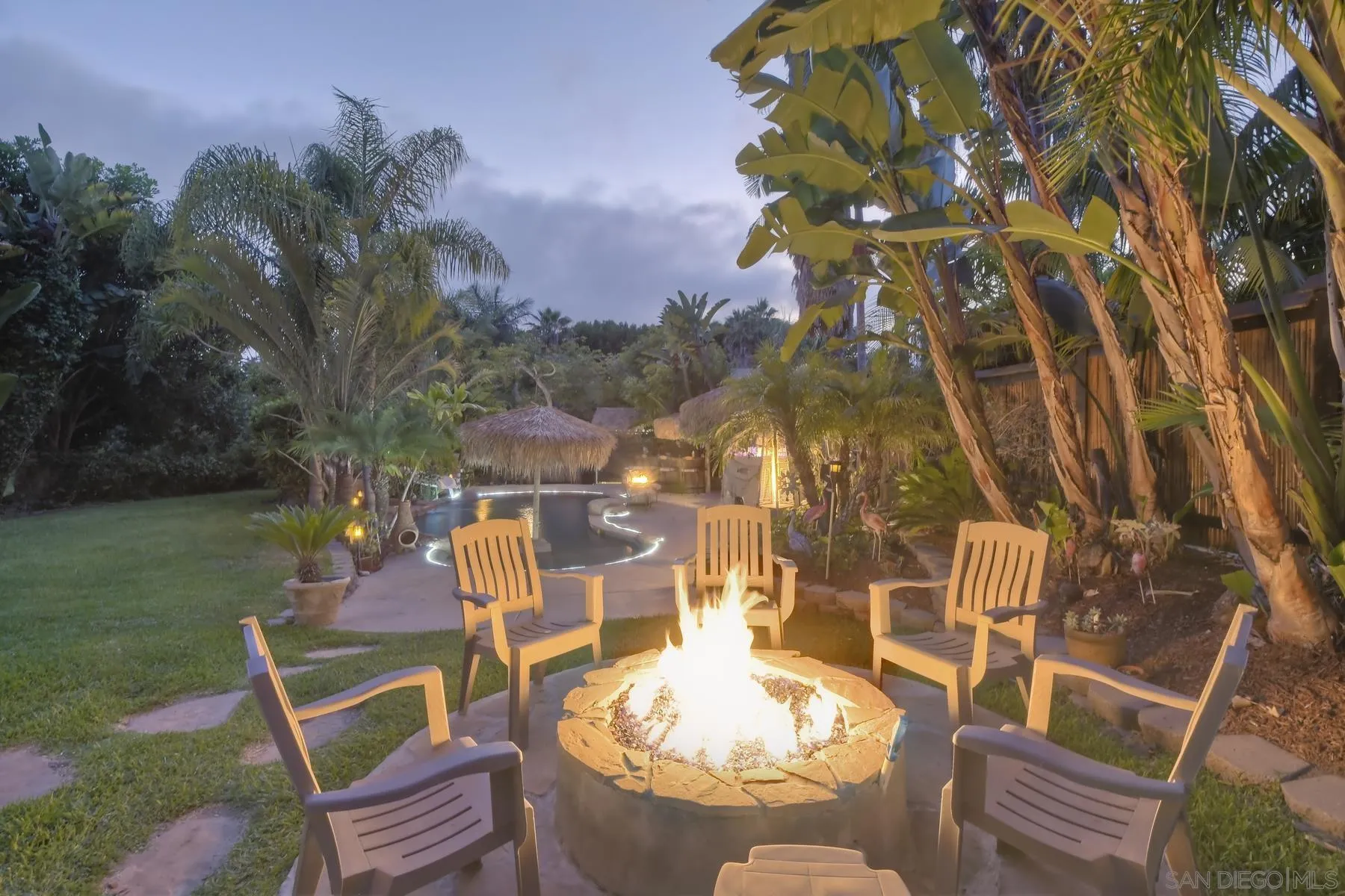 536 Saxony Road Encinitas, CA 92024 - Photo 46 of 57 a view of a chairs and table in backyard