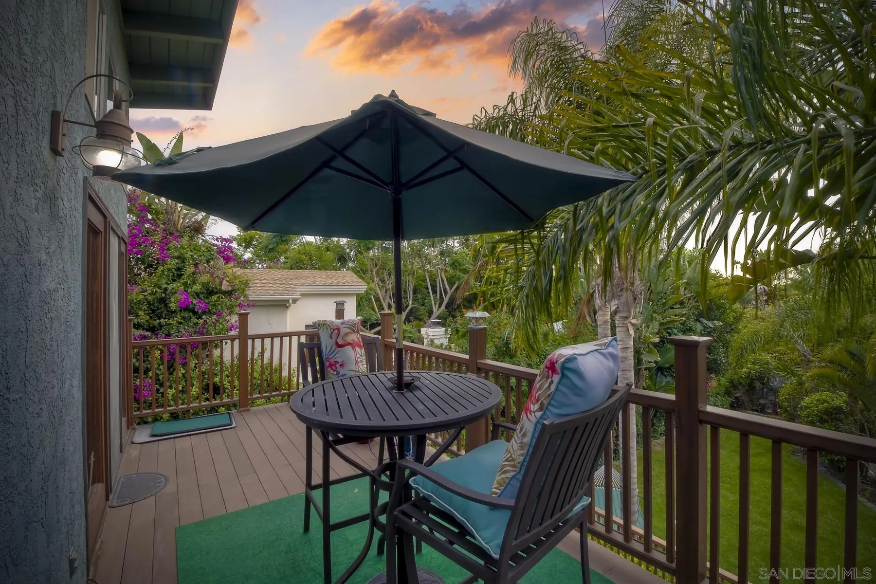 536 Saxony Road Encinitas, CA 92024 - Photo 47 of 57 a view of balcony with furniture and umbrella