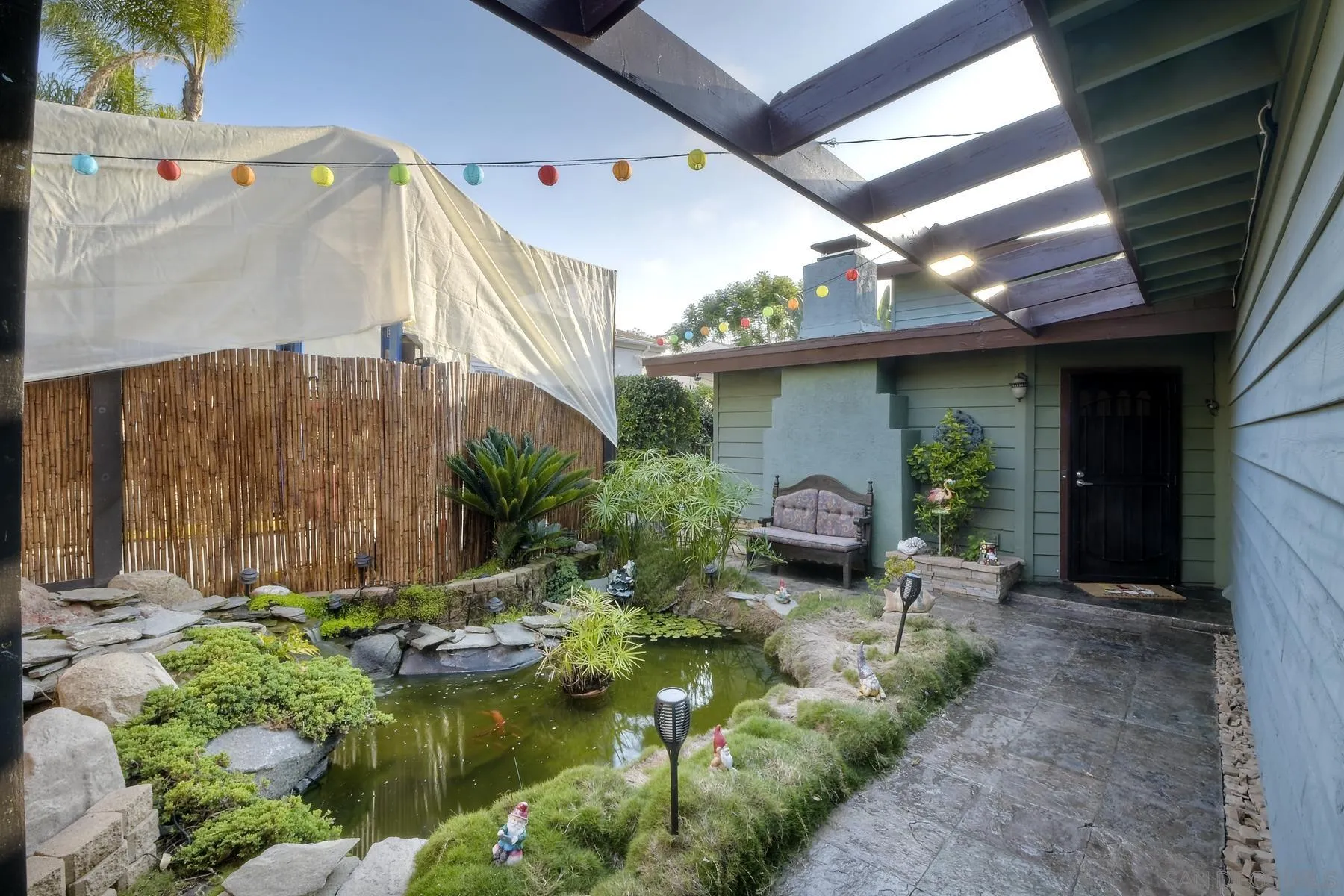 536 Saxony Road Encinitas, CA 92024 - Photo 55 of 57 a front view of a house with garden