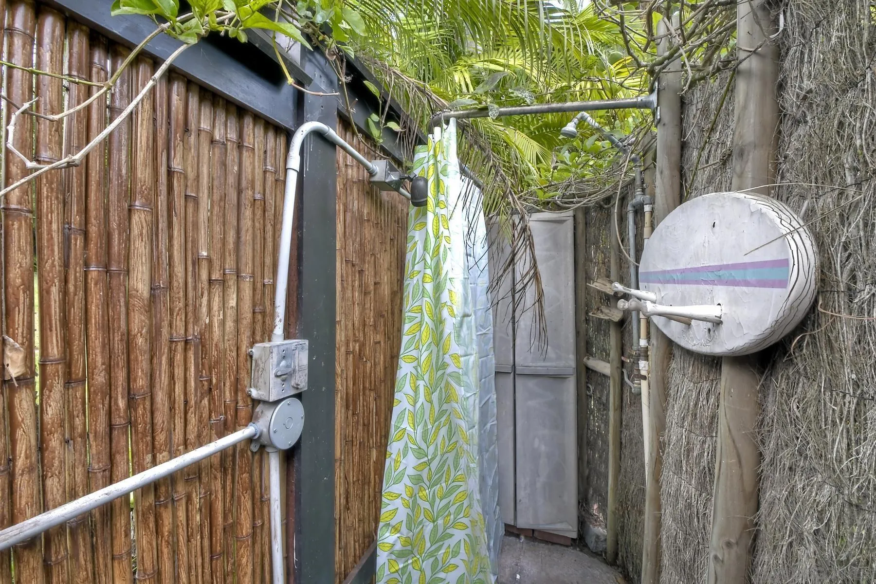 536 Saxony Road Encinitas, CA 92024 - Photo 57 of 57 a view of a house with a small deck and a wooden fence