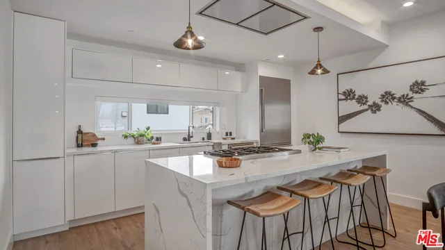 a kitchen with sink cabinets and counter space