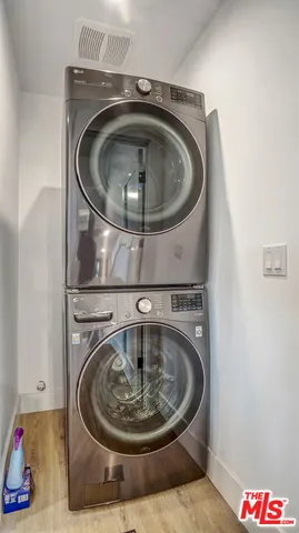 a utility room with washing machine