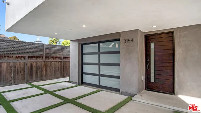 a view of a brick building with many windows