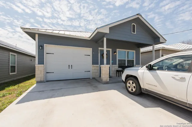 a car parked in front of a house