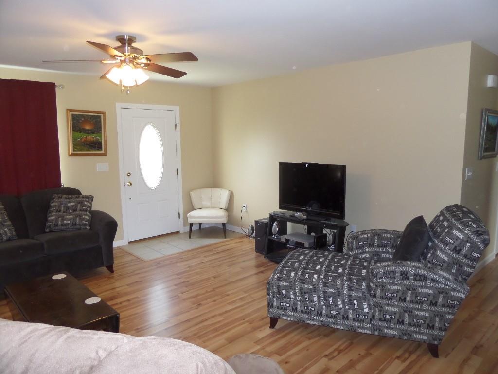 247 Fuller Road Hermon, ME 04401 - Photo 5 of 17 laminate flooring and tiled near the...