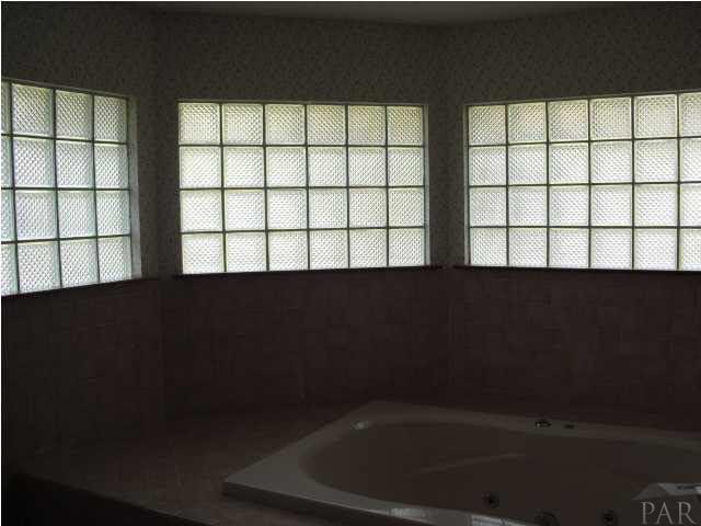2010 Eventide Road Milton, FL 32583 - Photo 9 of 13 Garden tub with block window