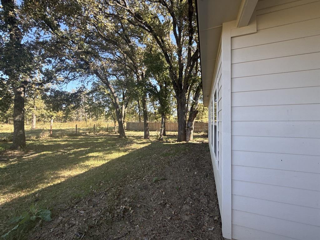 129 Towering Oaks Tool, TX 75143 - Photo 19 of 20 a view of outdoor space with trees