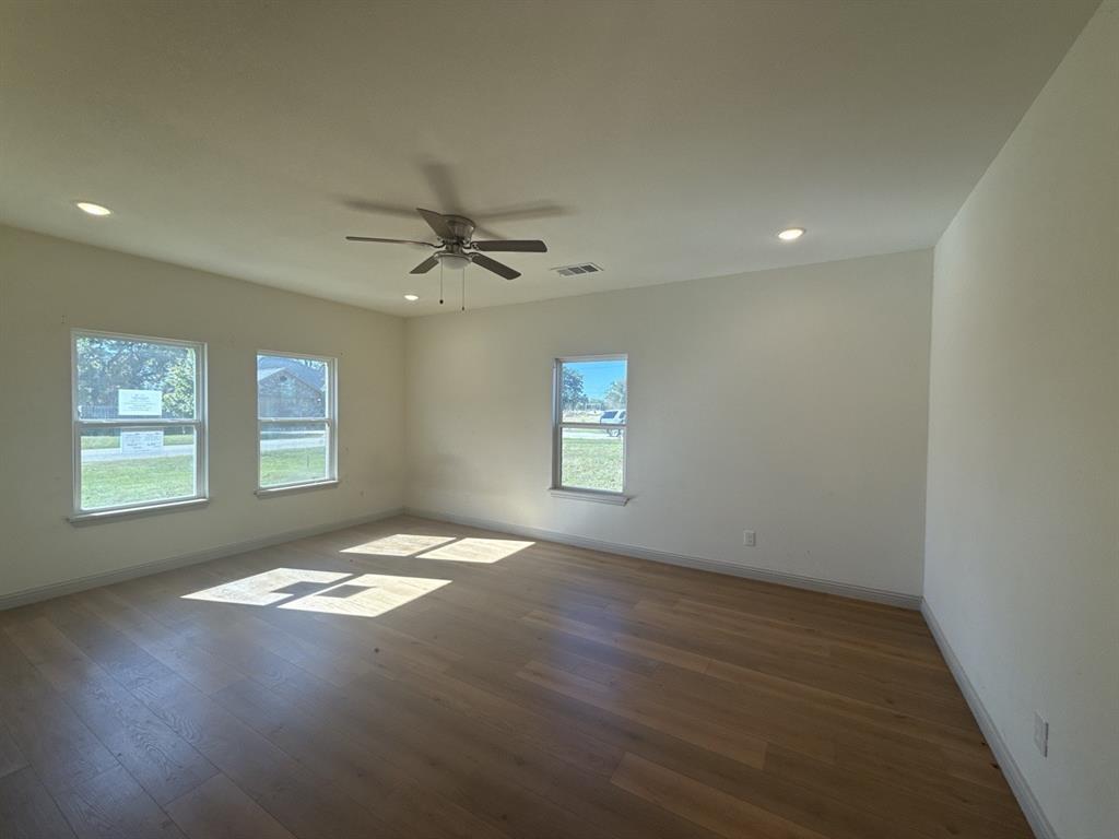 129 Towering Oaks Tool, TX 75143 - Photo 6 of 20 a view of an empty room and window