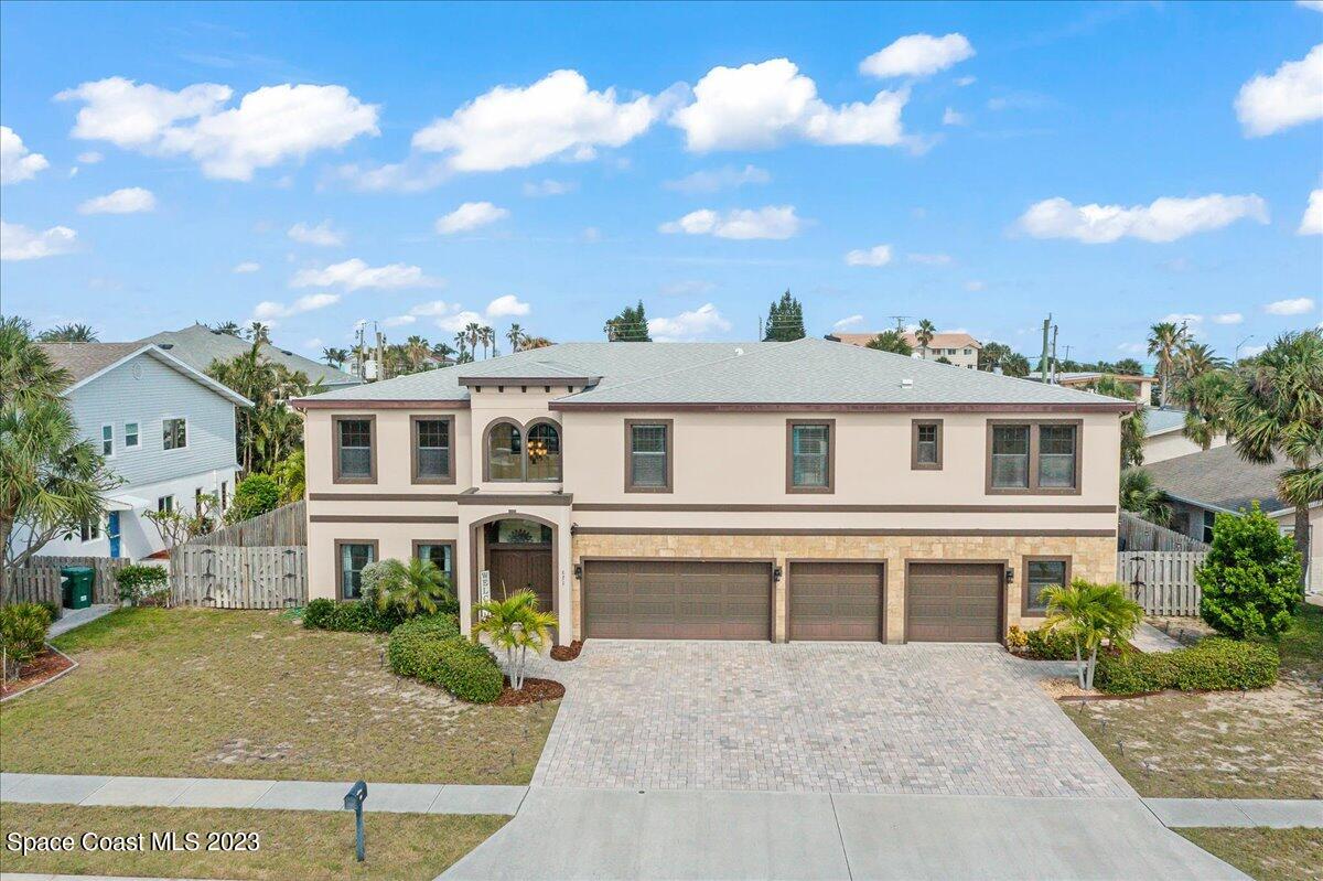 671 Palm Drive Satellite Beach, FL 32937 - Photo 1 of 69 front view of house with a yard