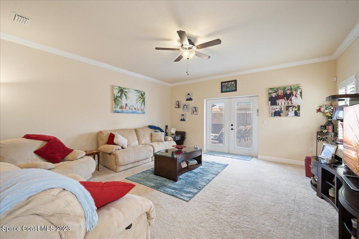 671 Palm Drive Satellite Beach, FL 32937 - Photo 46 of 69 a living room with furniture