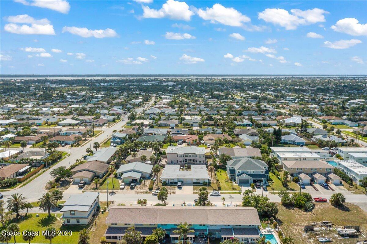 671 Palm Drive Satellite Beach, FL 32937 - Photo 65 of 69 an aerial view of residential houses with outdoor space