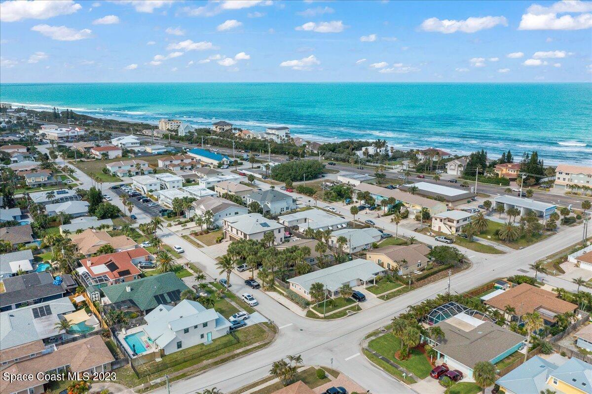 671 Palm Drive Satellite Beach, FL 32937 - Photo 66 of 69 an aerial view of residential houses with outdoor space and ocean view