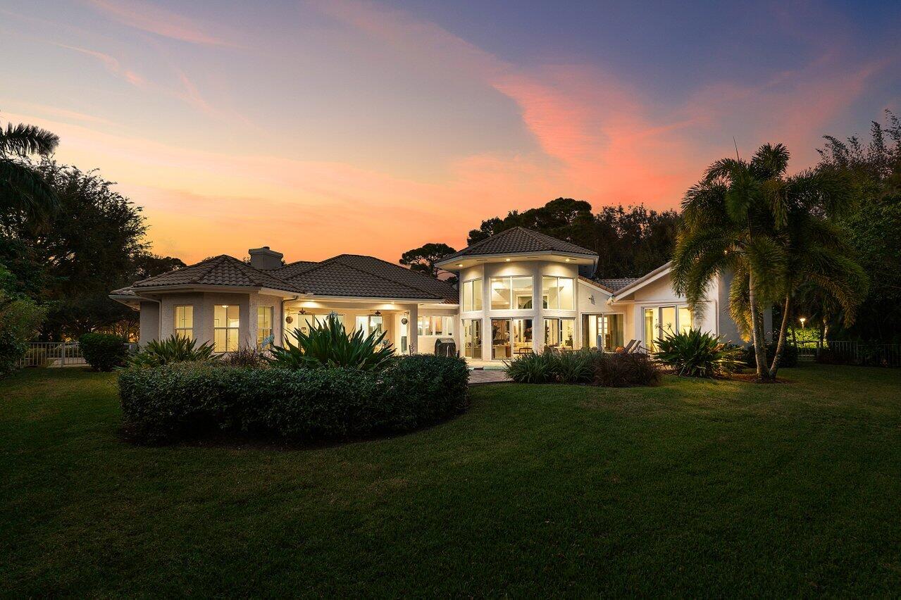 2450 Northwest 41st Street Boca Raton, FL 33431 - Photo 2 of 62 a view of house with garden