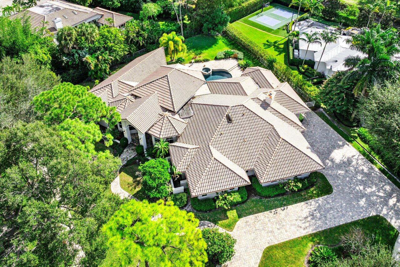 2450 Northwest 41st Street Boca Raton, FL 33431 - Photo 40 of 62 an aerial view of a house with a yard and garden