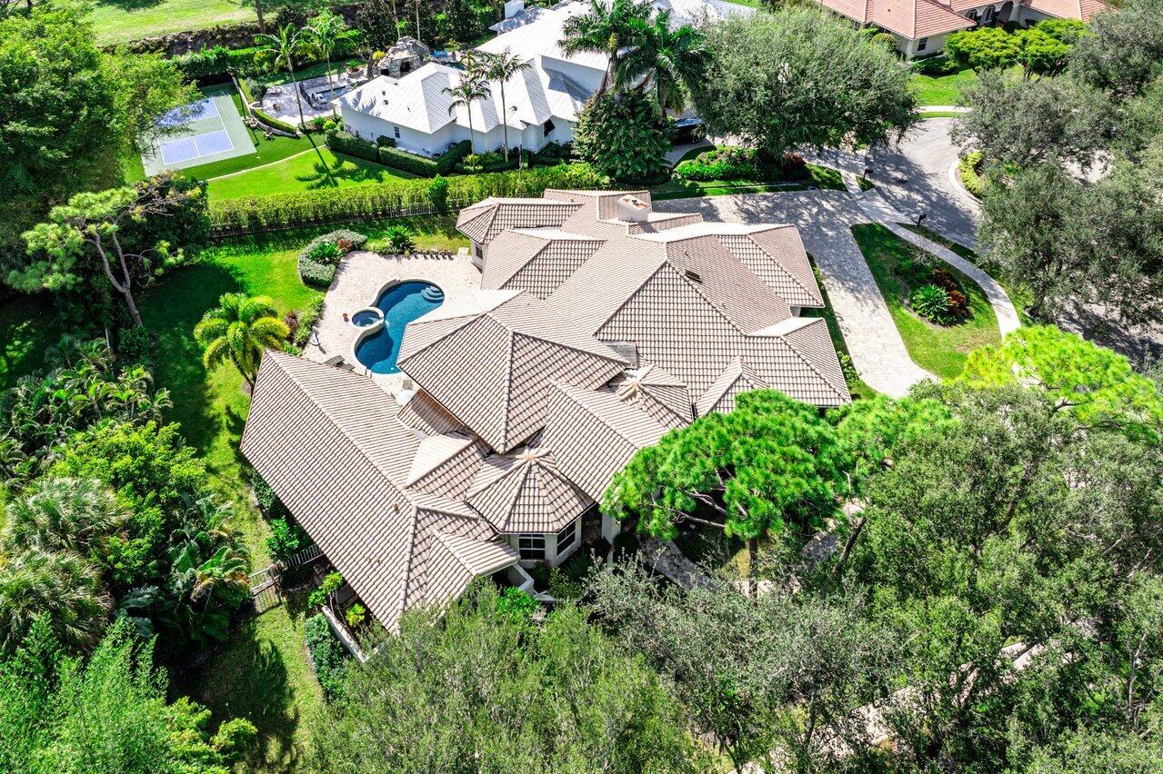 2450 Northwest 41st Street Boca Raton, FL 33431 - Photo 41 of 62 an aerial view of residential house with outdoor space and street view
