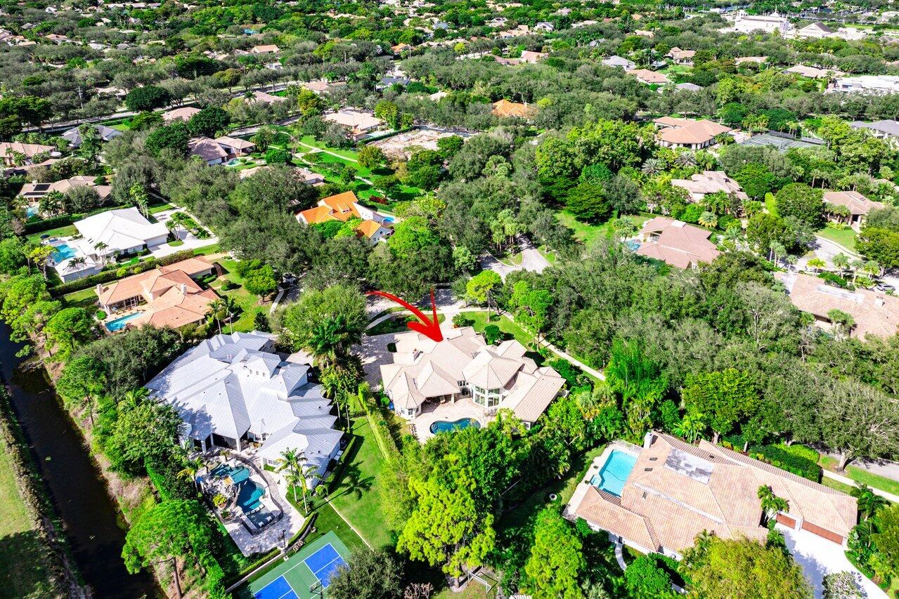 2450 Northwest 41st Street Boca Raton, FL 33431 - Photo 47 of 62 an aerial view of residential house with outdoor space and swimming pool