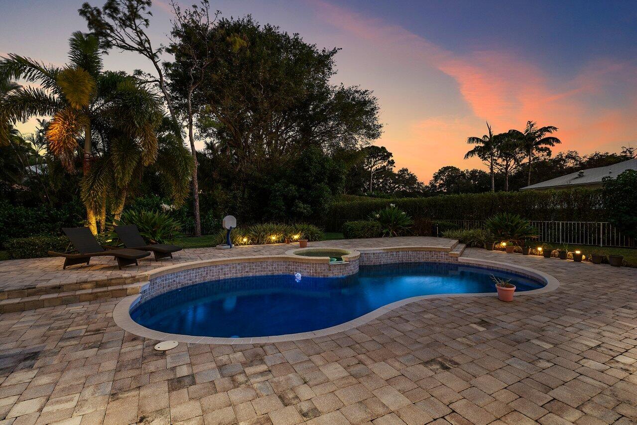 2450 Northwest 41st Street Boca Raton, FL 33431 - Photo 55 of 62 a view of outdoor space yard swimming pool and patio
