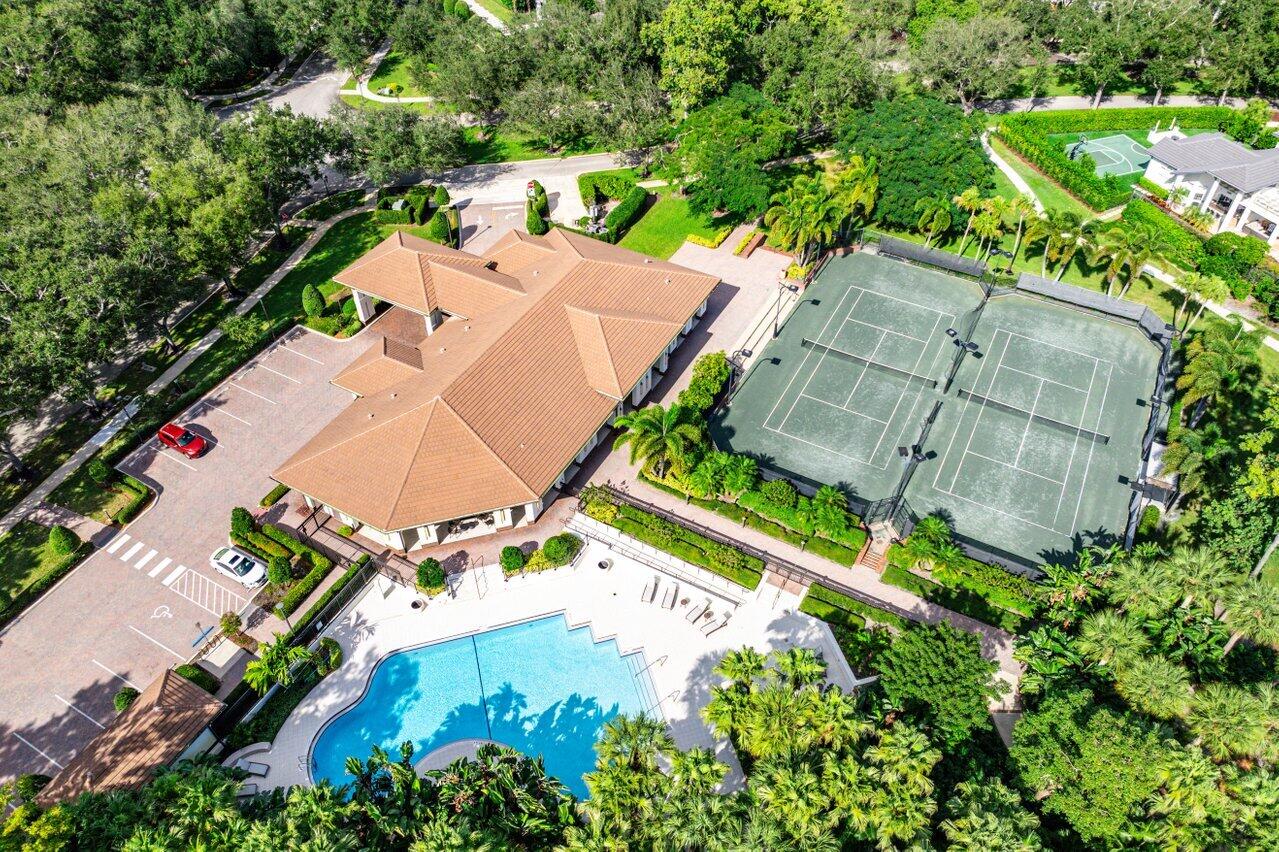 2450 Northwest 41st Street Boca Raton, FL 33431 - Photo 61 of 62 an aerial view of residential house with outdoor space and swimming pool