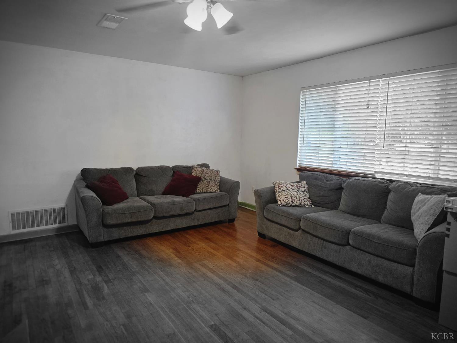 275 Ida Way Hanford, CA 93230 - Photo 2 of 21 a living room with furniture and a large window