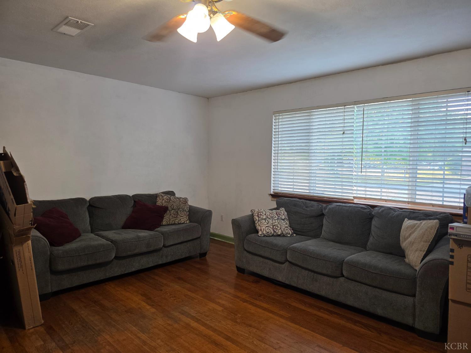 275 Ida Way Hanford, CA 93230 - Photo 3 of 21 a living room with furniture and a window