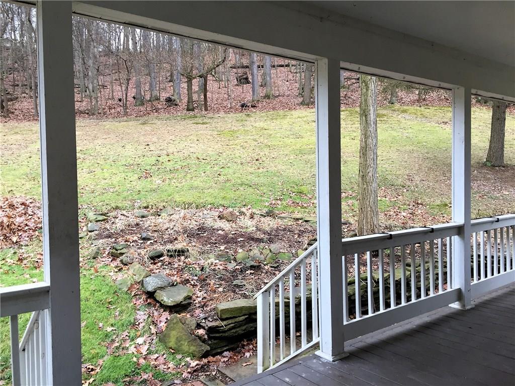 10020 Rinaman Road Wexford, PA 15090 - Photo 22 of 25 Just steps from the covered porch are planting beds for your favorite perennials.