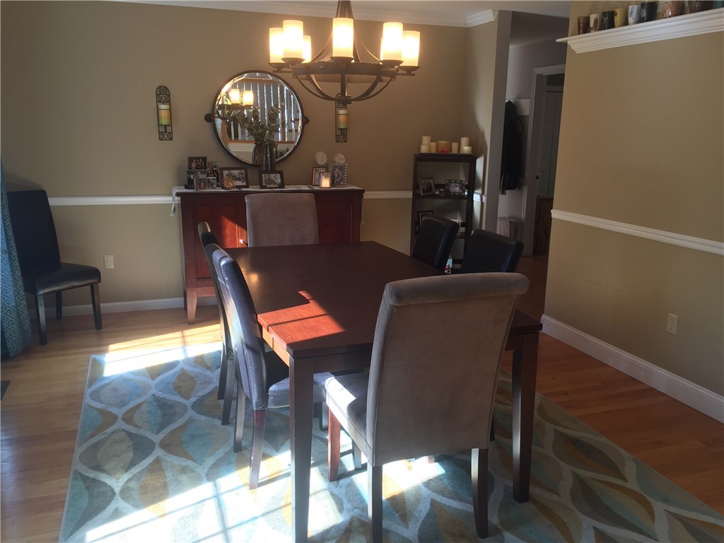 6 Princess Pine Road Lincoln, RI 02865 - Photo 14 of 40 Another perspective of the dining room shows hardwood floors and not one, but two entrances.