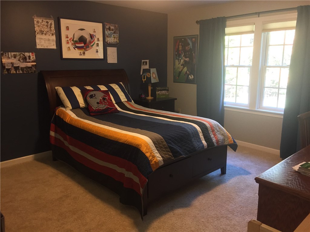 6 Princess Pine Road Lincoln, RI 02865 - Photo 25 of 40 The fourth bedroom is large in size and also has a walk in closet.