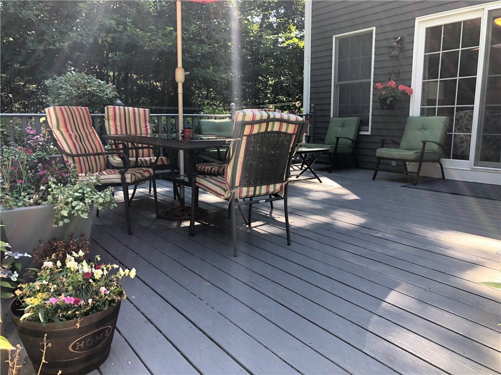 6 Princess Pine Road Lincoln, RI 02865 - Photo 35 of 40 Enter the large deck through sliders off of the kitchen/living room. Mature trees make the perfect natural backdrop.