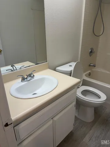 a bathroom with a sink and a toilet