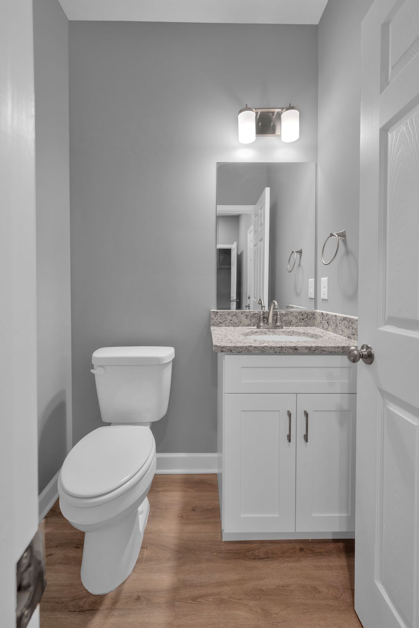889 Blessing Way Gallatin, TN 37066 - Photo 13 of 37 a bathroom with a toilet sink and mirror