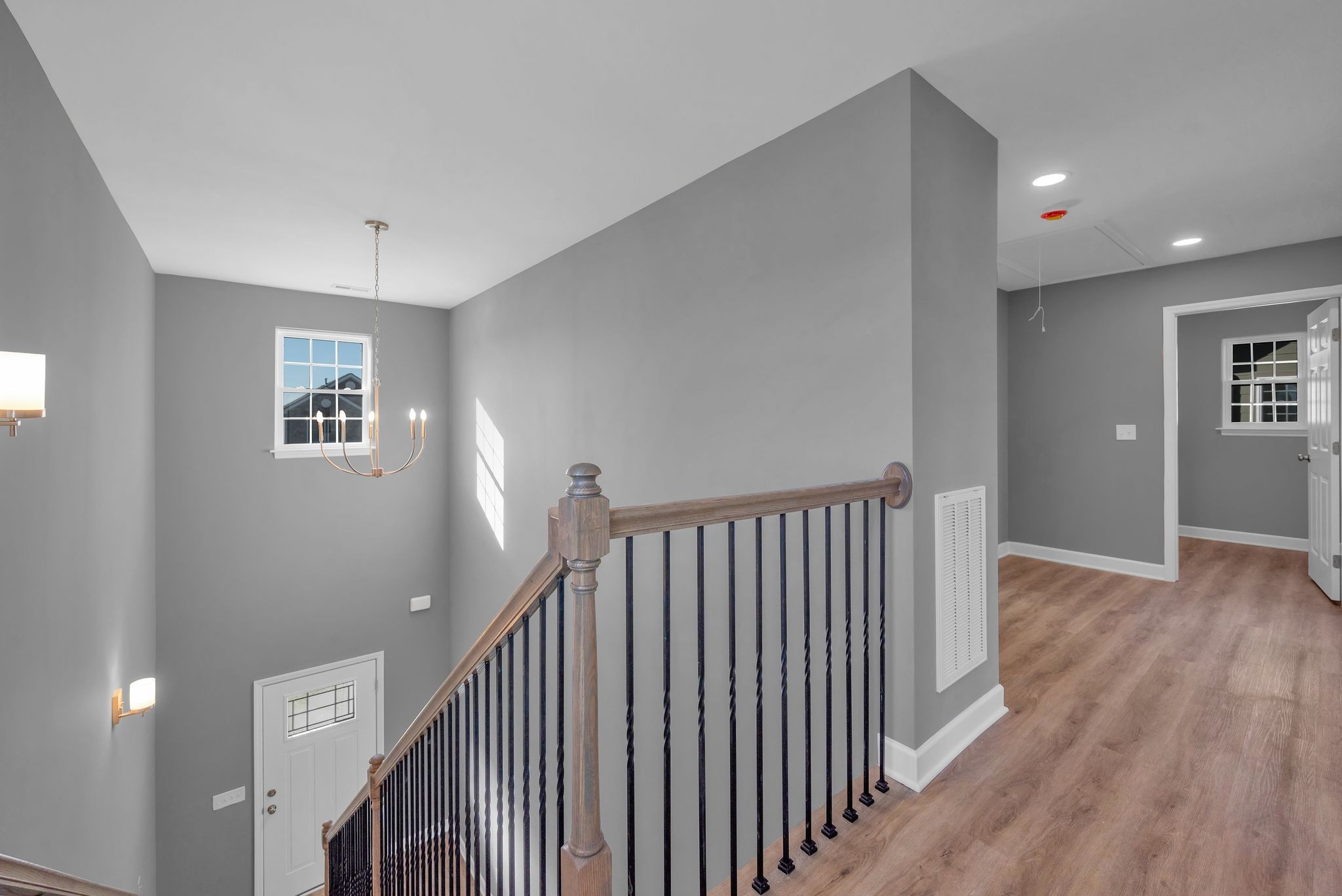 889 Blessing Way Gallatin, TN 37066 - Photo 20 of 37 a view of hallway with stairs and wooden floor