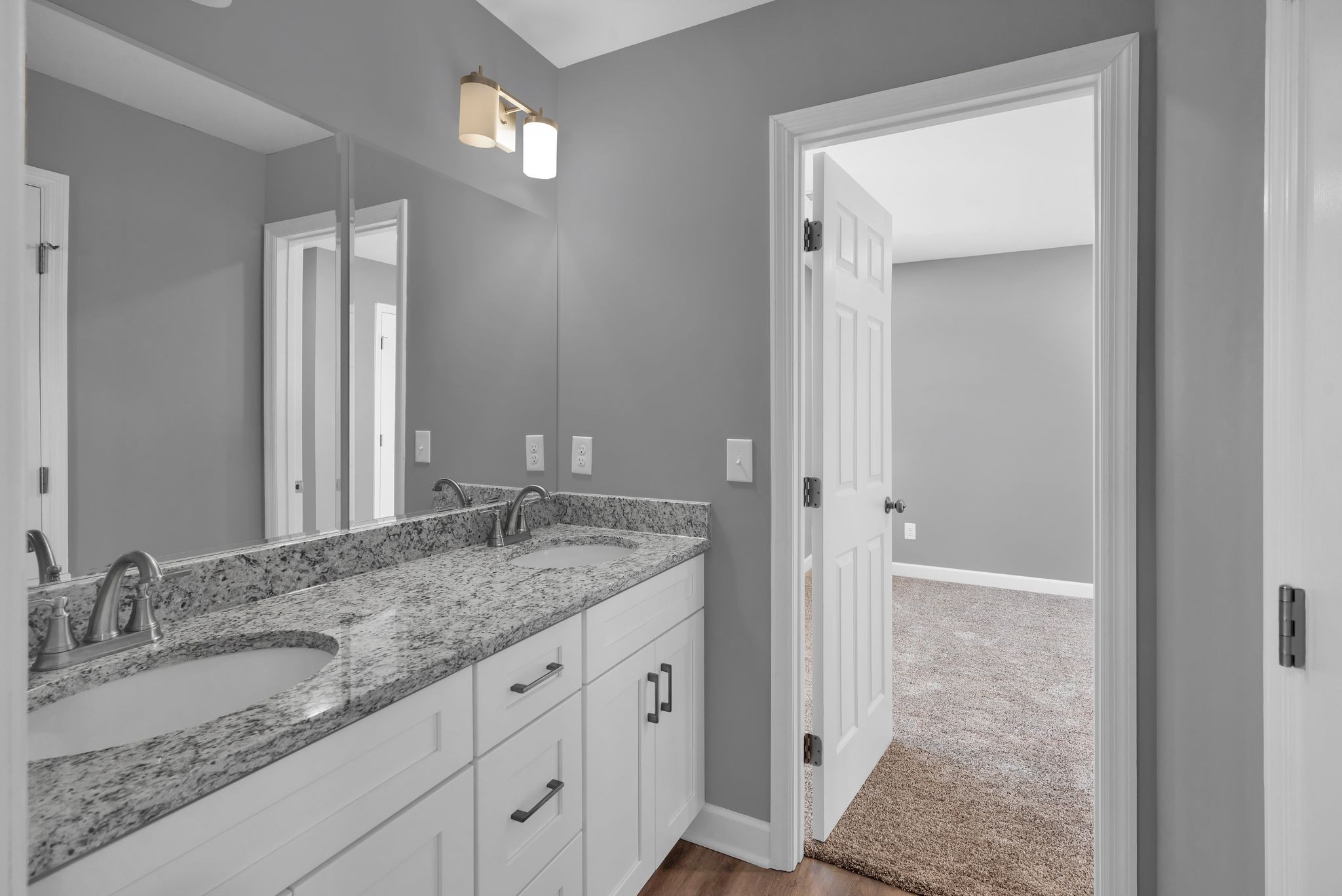 889 Blessing Way Gallatin, TN 37066 - Photo 27 of 37 a bathroom with a granite countertop sink and a mirror