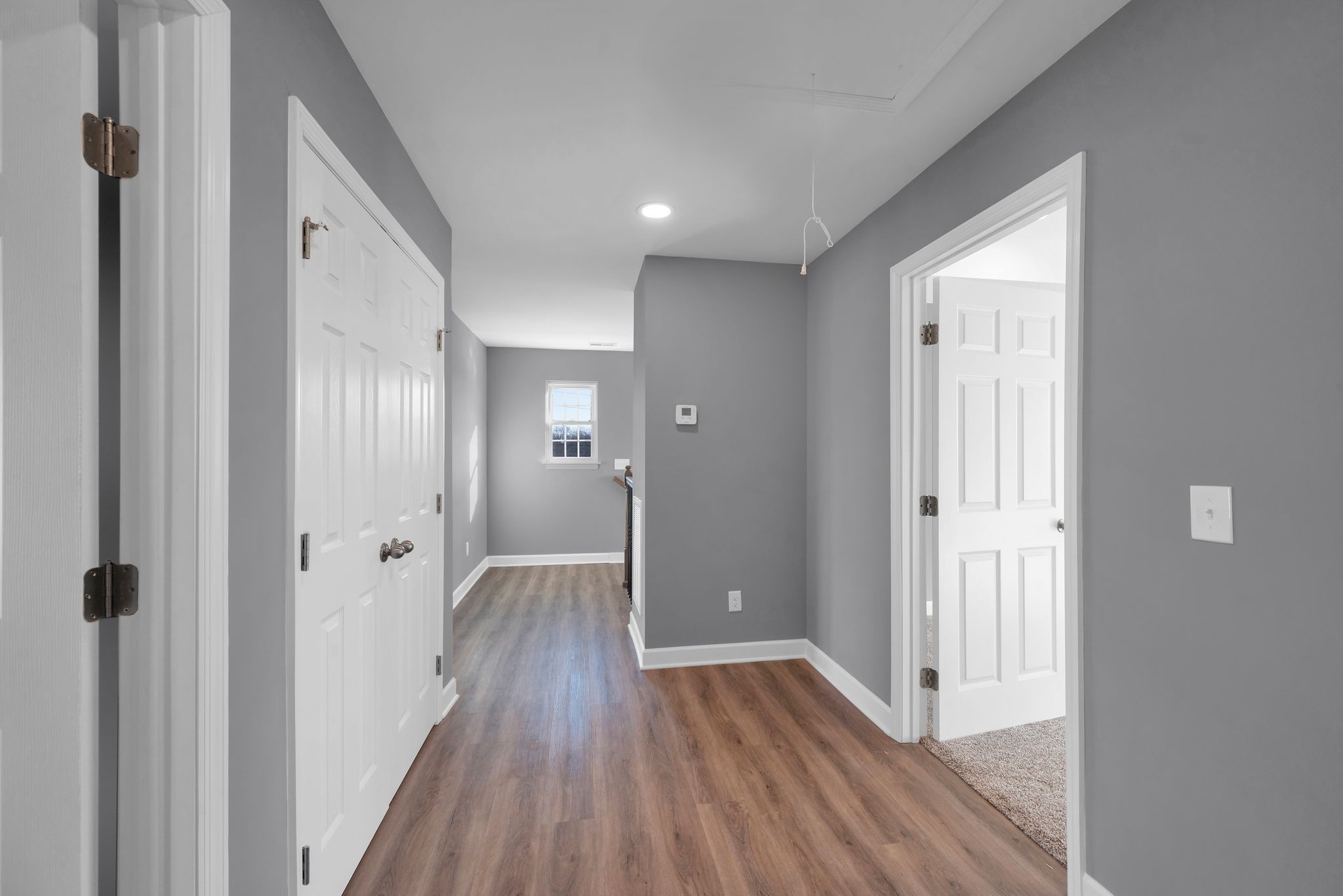 889 Blessing Way Gallatin, TN 37066 - Photo 30 of 37 a view of a hallway with wooden floor