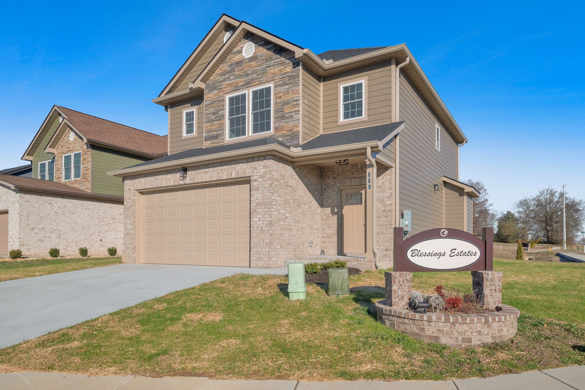 889 Blessing Way Gallatin, TN 37066 - Photo 5 of 37 a front view of a house with a yard