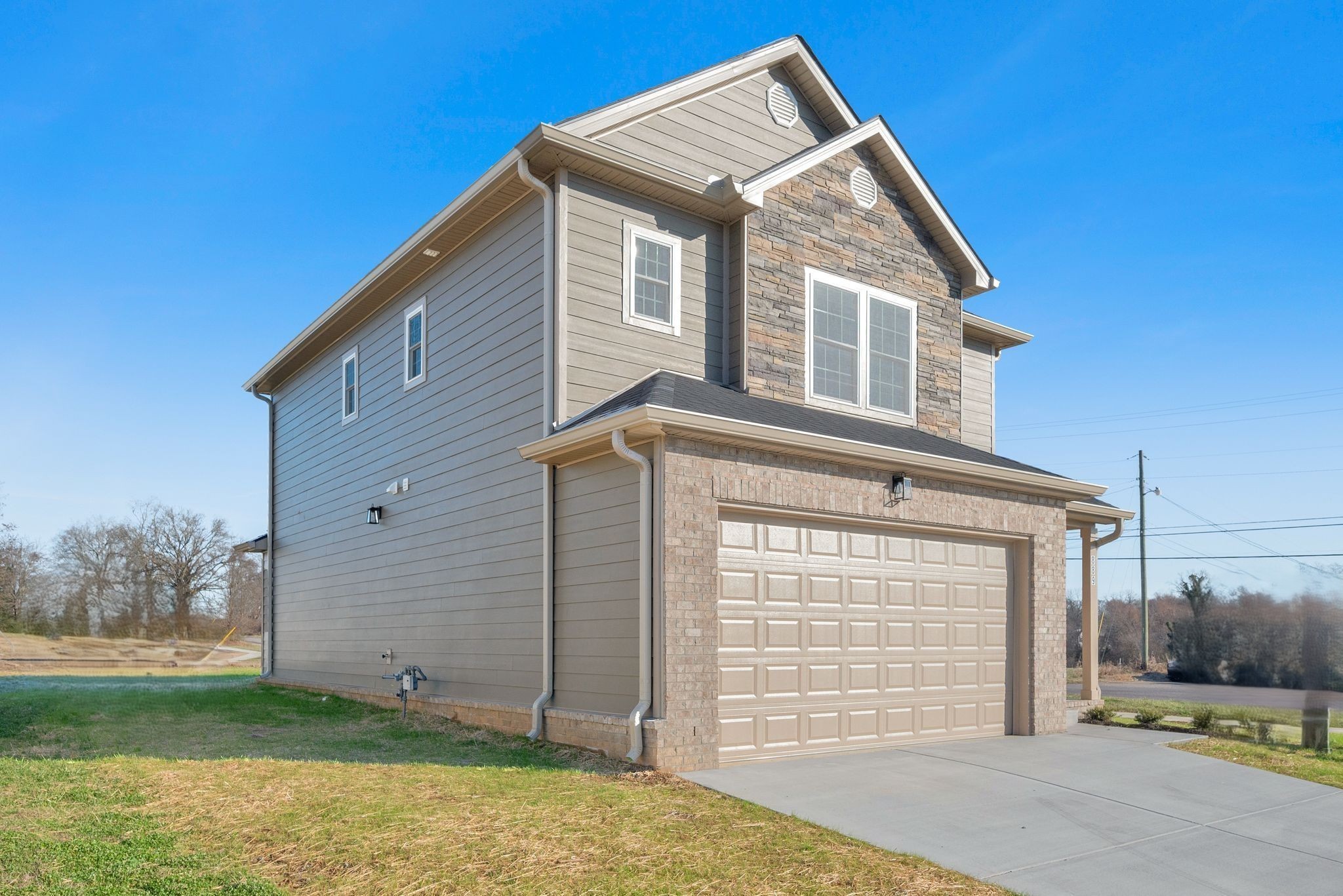 889 Blessing Way Gallatin, TN 37066 - Photo 6 of 37 a front view of a house with a yard