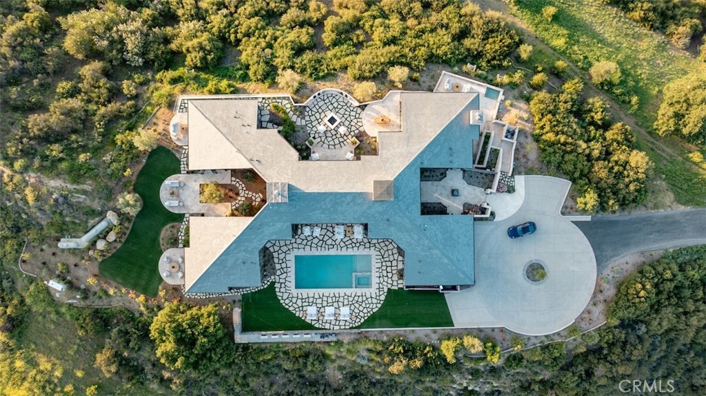 3121 Old Topanga Canyon Road Calabasas, CA 91302 - Photo 11 of 75 an aerial view of a house with a swimming pool