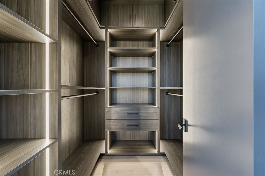 3121 Old Topanga Canyon Road Calabasas, CA 91302 - Photo 28 of 75 a view of walk in closet with empty racks