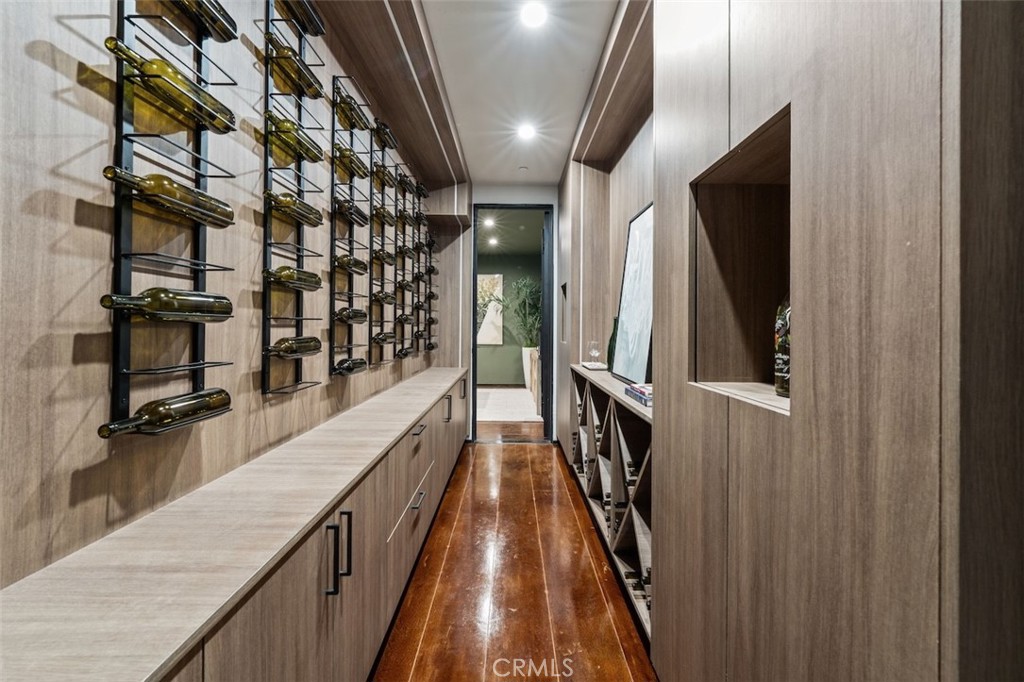 3121 Old Topanga Canyon Road Calabasas, CA 91302 - Photo 49 of 75 a view of a hallway with wooden floor and staircase