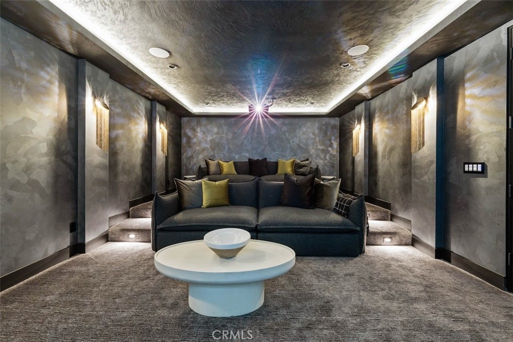 3121 Old Topanga Canyon Road Calabasas, CA 91302 - Photo 50 of 75 a living room with furniture and a glass door