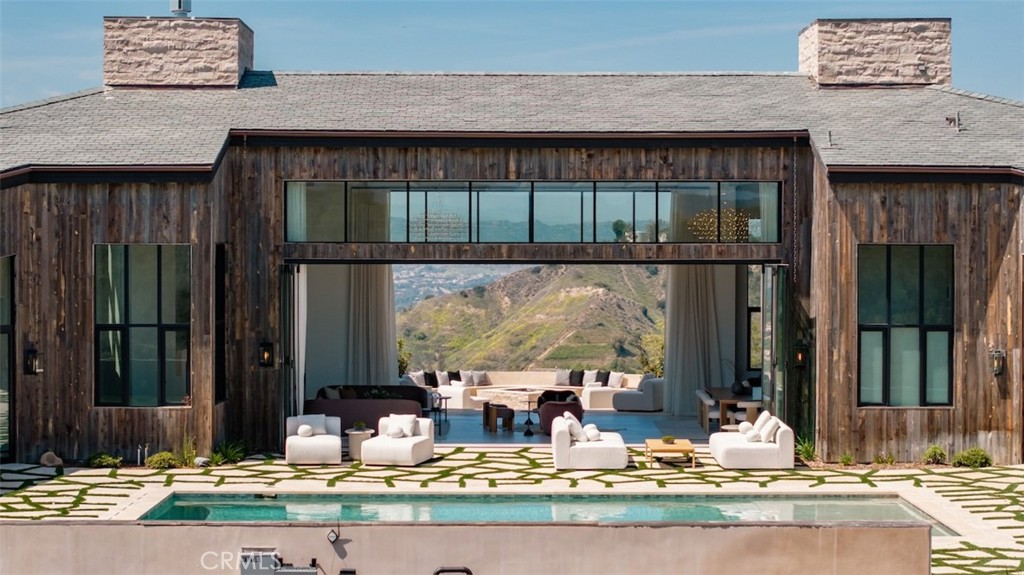 3121 Old Topanga Canyon Road Calabasas, CA 91302 - Photo 10 of 75 a view of swimming pool with outdoor seating