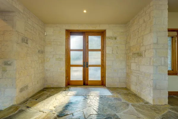 a view of an empty room and window