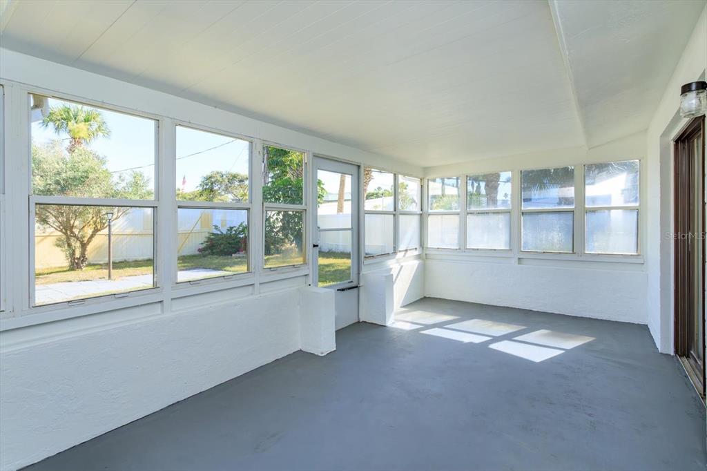 4319 South Peninsula Drive Ponce Inlet, FL 32127 - Photo 14 of 25 a view of an empty room with a window
