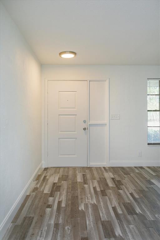 4319 South Peninsula Drive Ponce Inlet, FL 32127 - Photo 2 of 25 wooden floor in an empty room