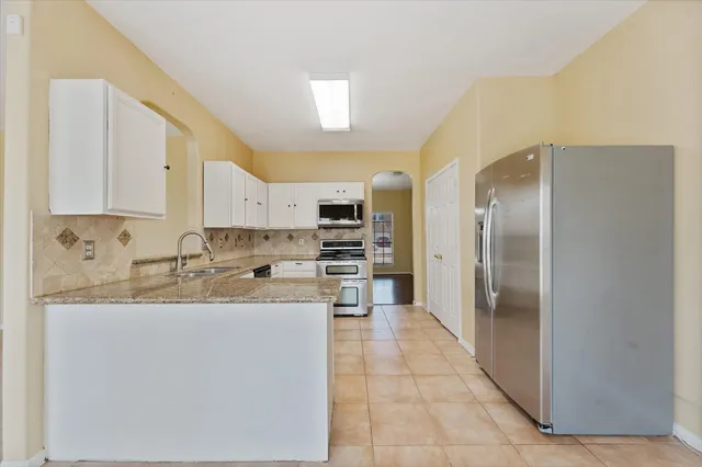 a view of a room with natural light
