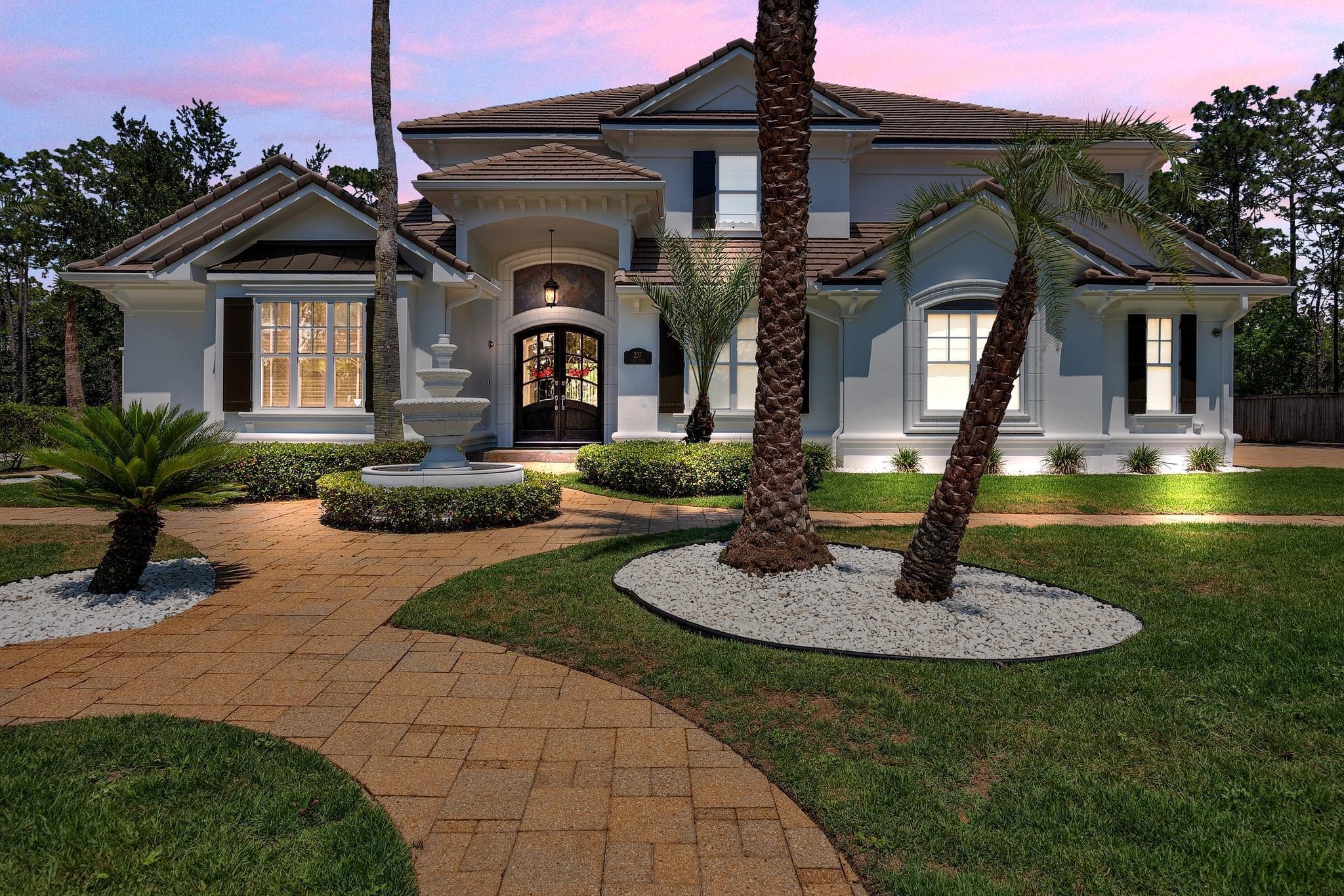 a front view of a house with entertaining space