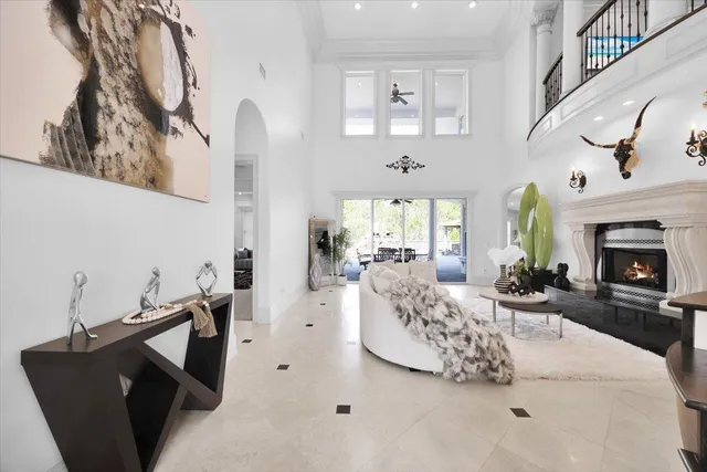 a view of a storage and utility room with dryer and washer