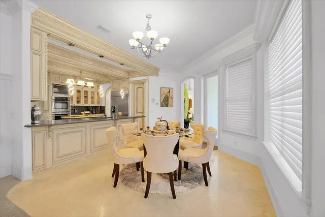 a bathroom with a sink vanity mirror and toilet